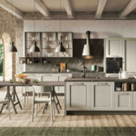 Cucina con isola e tavolo integrato